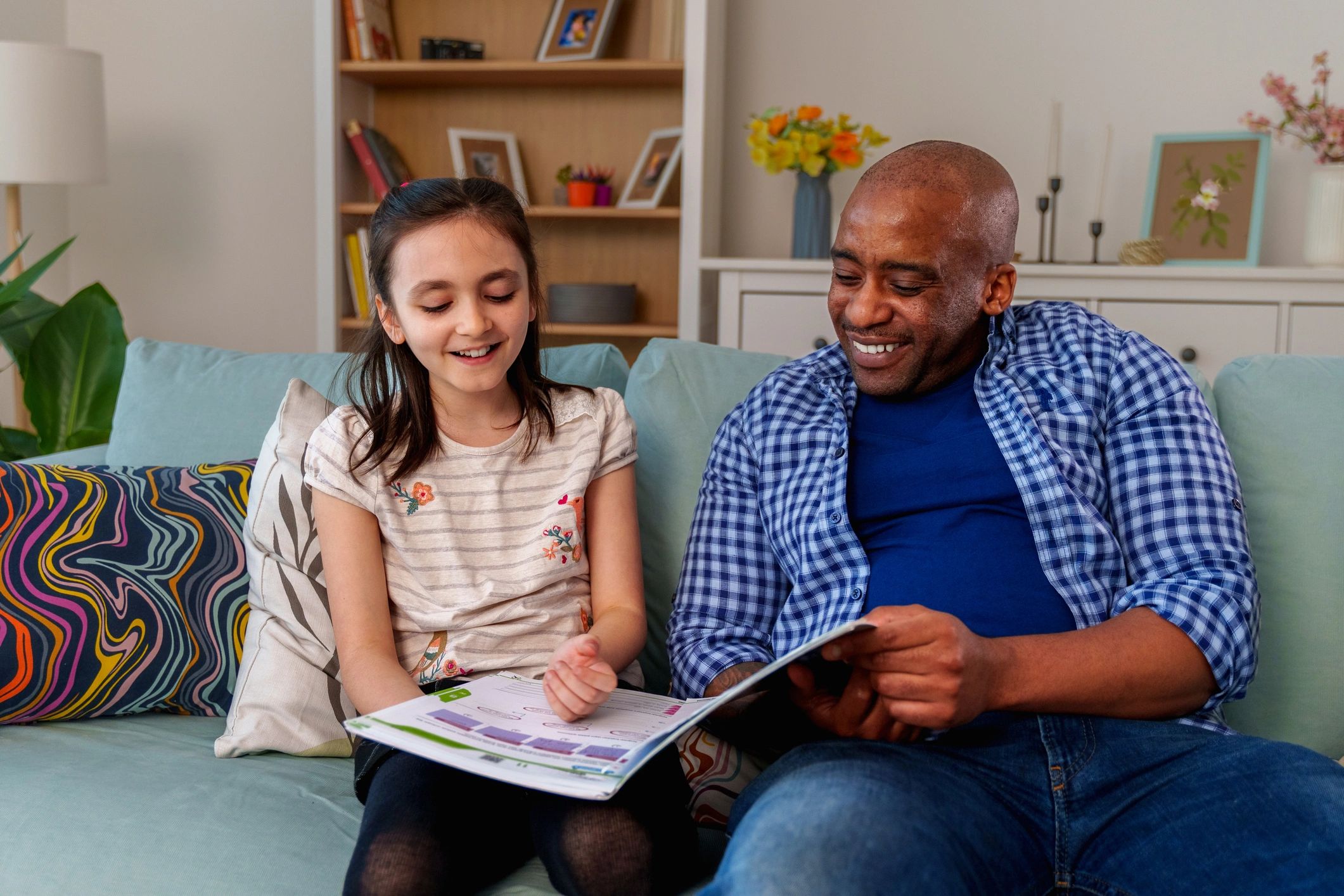 Parent reading with a child at home